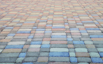Background, texture of urban multicolored pavers on the whole frame