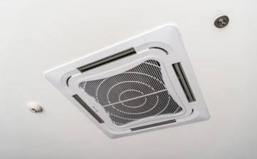 Close up of ceiling type air conditioner, ceiling mounted type
