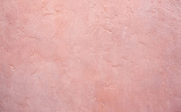 Pink stucco wall background.