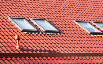 New red metal roof with skylights and Ventilation pipe for heat control